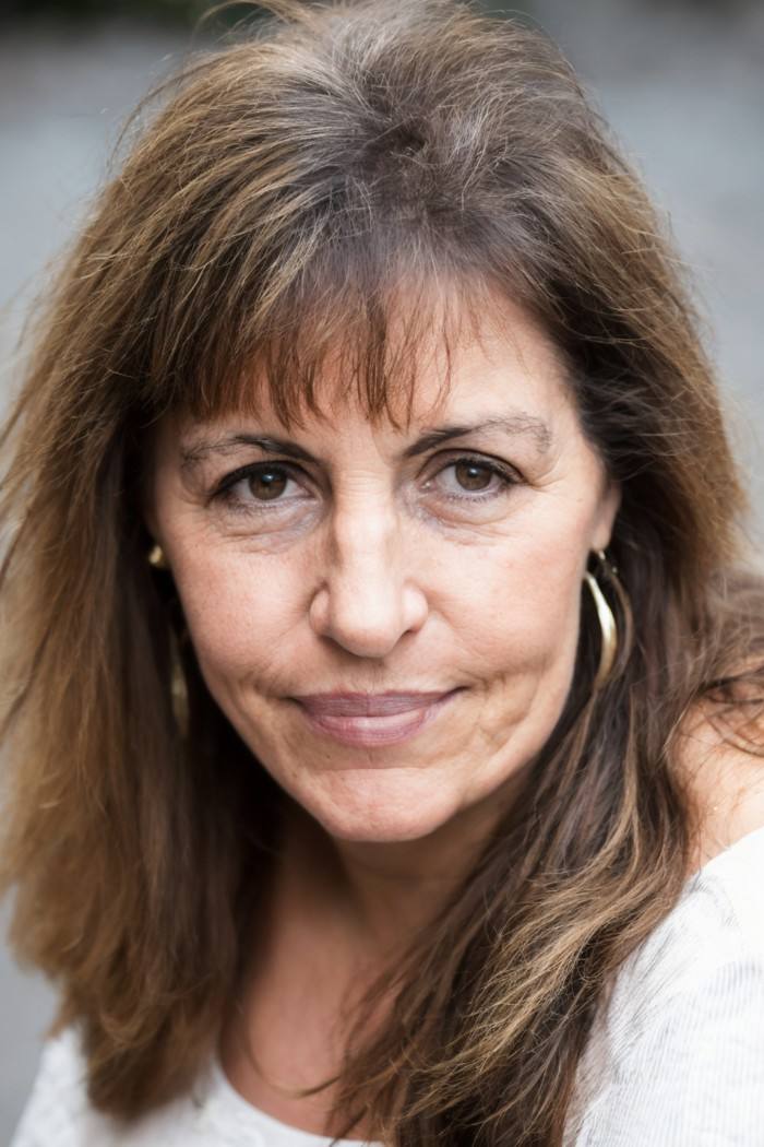 photo of a woman, argentinian, social worker, headshot