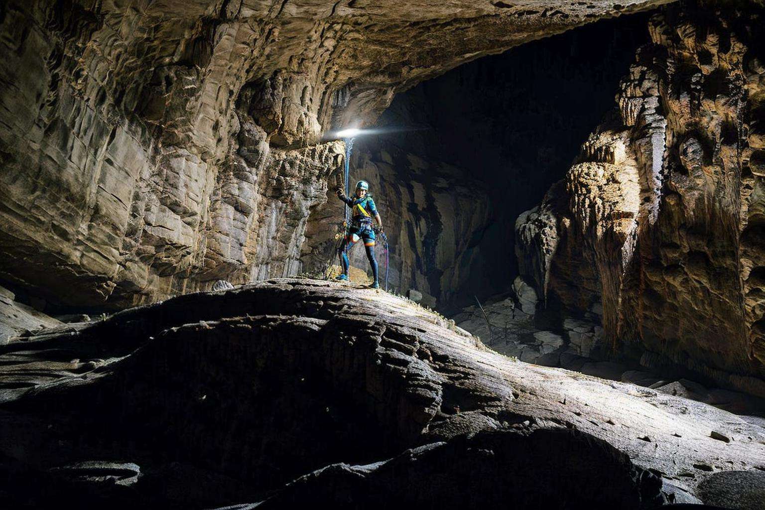 <lora:sondoong-000010:0.8>, cave, sondoong, plant, ((Helmet, Headlamp, Knee pads, Gloves, Boots, Climbing gear, Harness, )), 1girl, a stunning photo with beautiful saturation, ultra high res,(realistic:1.4)),deep shadow,(best quality, masterpiece), pale skin, dimly lit, shade, flustered, blush, highly detailed, ((upper body:0.8)), skinny, BREAK depth of field, film grain, wrinkled skin, looking at viewer, knee,  warm smile,, (masterpiece,best quality:1.5)