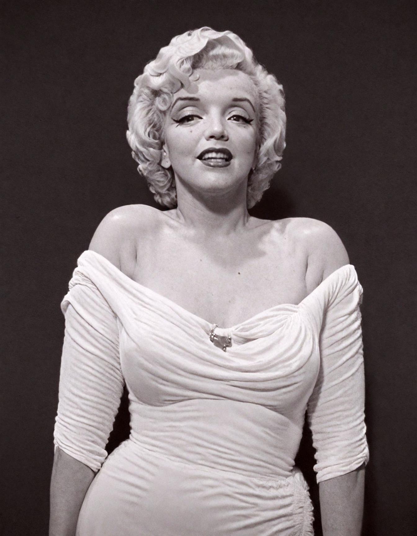 photo of (marilyn monroe:1.1),shadow,whitedress, off shoulder, looking at viewer, ,in (halsman:1.05) style,