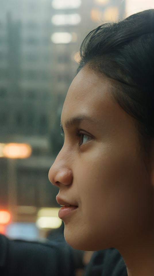 1 beautiful girl, (ohwx farah:1), from front, sad expression, short wavy black hair, staring at the viewer, close up face, in a burning city background with a crowd of riot, at war, bokeh, depth of field, dramatic lighting and scene,<lora:ohwx_farah_v2_real:0.8>, detailed natural skin textures, detailed face