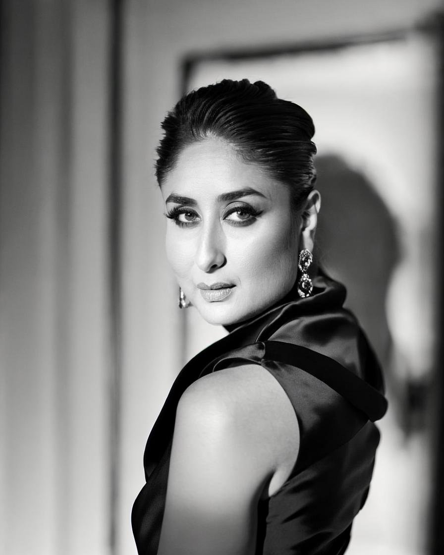 (masterpiece, solo, 1girl), high definition, highly detailed, <lora:[Celeb] Kareena Kapoor 1.0:1> ntg kareena kapoor, seductive expression, black dress, white background, cowboy shot,