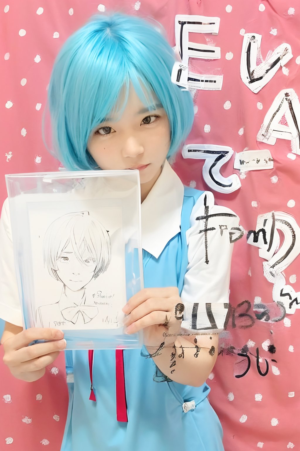 1boy, Androgynous male, solo, looking at viewer, short hair, shirt, ribbon, holding, school uniform, blue hair, white shirt, upper body, short sleeves, red ribbon, neck ribbon, pink background, polka dot, tokyo-3 middle school uniform, ayanami rei, A framed illustration of a black-haired man's face