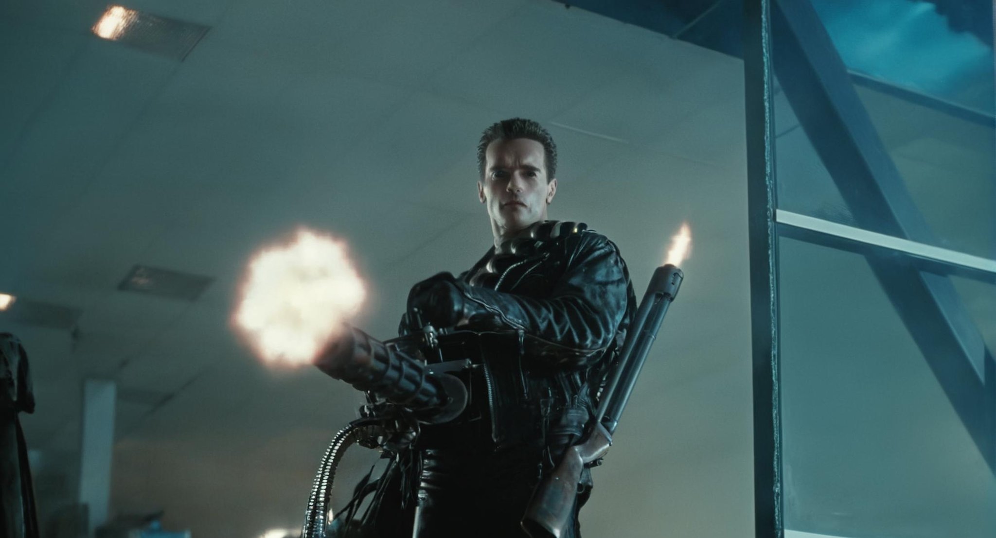 cinematic film still of  <lora:Handheld M134 Minigun:0.6>In the 1990's a man in a black leather jacket holding a Handheld M134 Minigun,Extras,weapon,gun,no humans,science fiction,blue theme,firing,spacecraft , cinematic color, contrast, filmic, science fiction themed, action themed, cinematic look, dramatic light, dramatic shadow light, realistic, realism, perfection, perfect, Kodak, Kodak film, movie still, Terminator style, The Terminator 1991 Film style <lora:Terminator 2 style:1>, shallow depth of field, vignette, highly detailed, high budget, bokeh, cinemascope, moody, epic, gorgeous, film grain, grainy