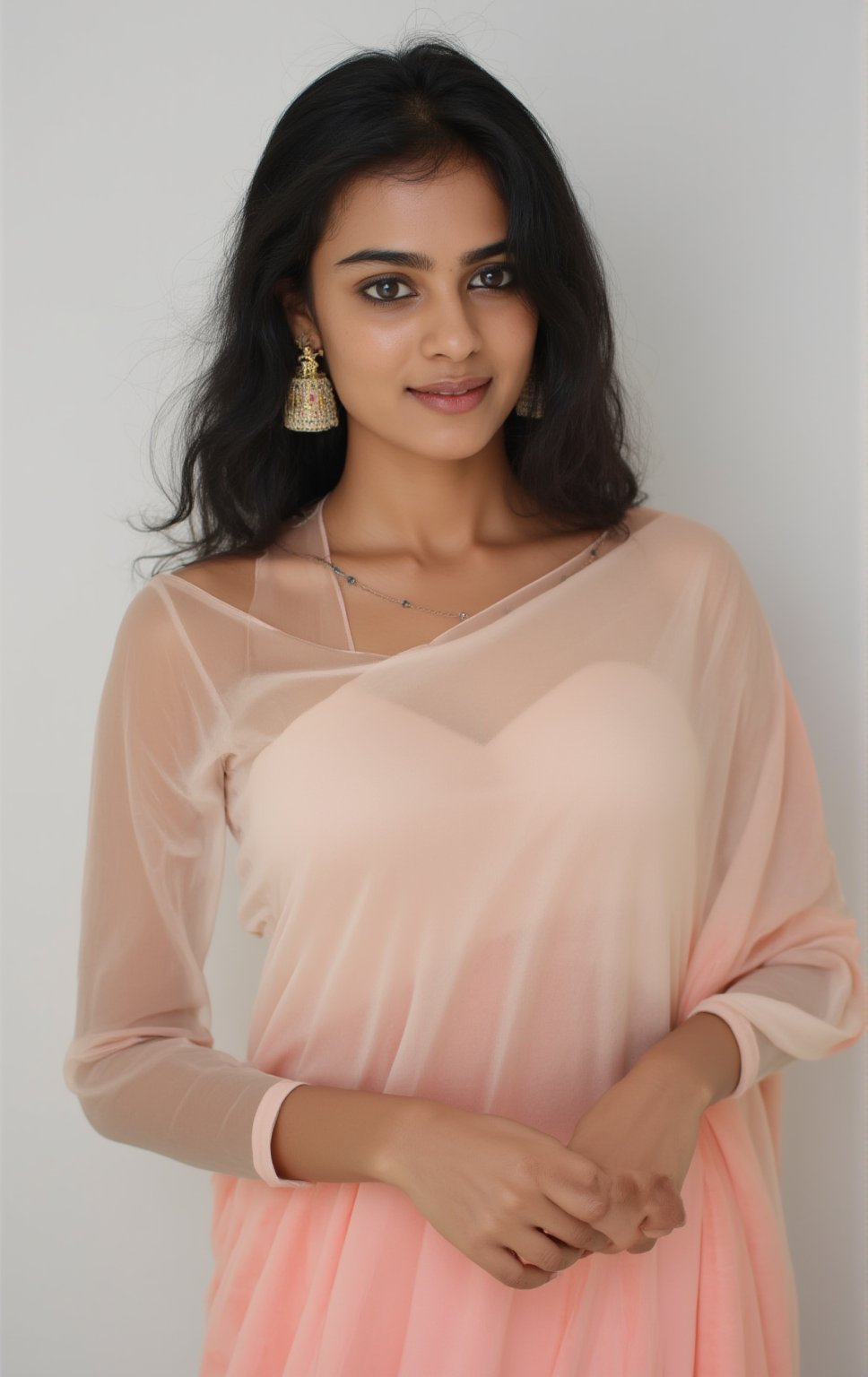 A Kerala girl stands confidently in a studio for a professional model photoshoot, her attire a striking fusion of traditional and modern. She wears a transparent silk saree, delicately draped around her body, blending traditional elegance with a modern, sensual touch. The saree’s light, transparent fabric flows naturally, catching the soft studio lighting and subtly revealing her figure beneath. Her blouse is modern and fitted, adding an edge of contemporary fashion to the traditional saree.

Her white skin glows under the soft lighting, which highlights her flawless complexion and the gentle texture of the saree. Her facial expression is poised and confident, with a slight, alluring smile, adding a touch of mystery. Her features are perfectly symmetrical, from her high cheekbones to her softly curved lips, ensuring a visually balanced portrait that draws the viewer in.

The background is kept simple and slightly blurred, allowing the focus to remain on her and her stunning attire. The combination of modern silk fabric with the transparent saree gives a sleek, sensual effect without overpowering the traditional essence of the look.,Girl25yo