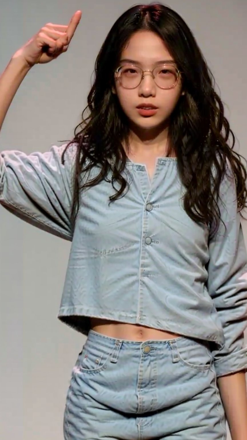 The image shows a person striking a pose with their left hand raised and touching the right side of their face. They are wearing a white crop top and light blue denim pants, which are partially unbuttoned, suggesting a casual or fashion-oriented setting. The background is nondescript, focusing attention on the subject. The person's pose and attire give the impression of a dynamic and stylish portrait., ((16 years old)), ((asian)) , ((POV)), ((close-up)), ((glasses))