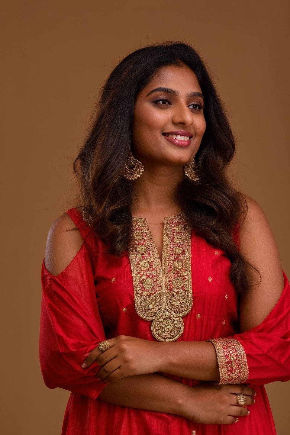 20 year old indian woman,  thick waist, long curly brown hair, gold jewels, front view, movie scene, cinematic, high-quality, ultra-detailed, professionally color graded, professional photography.  ( hard light:1.2), (volumetric:1.2), well-lit, double exposure, award-winning photograph, dramatic lighting, dramatic shadows, illumination, long shot, wide shot, full body, at studio, smart watch on left hand, happy_face, Fast shutter speed, 1/1000 sec shutter, golden_jewelry, embroidered traditional indian dress, , salwar, red cloth, sleeveless, dark background