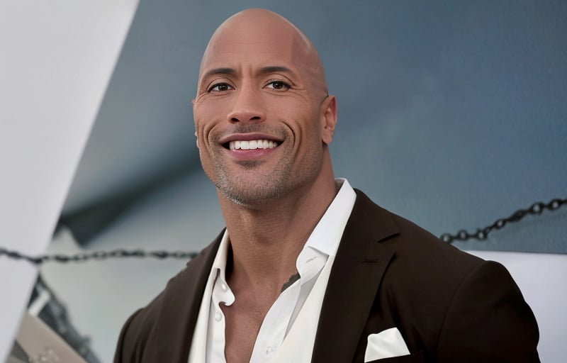 A photo of emb-babs, Dwayne Douglas Johnson,  (looking at the camera), photoshoot style, seductive expression, 8k HD, RAW, dslr, perfect features, flawless skin, skin pores, professional, masterpiece, (photorealistic:1.4), detailed, intricate, high resolution, detailed background, fcDetailPortrait,  epiCRealism, OverallDetail, upturned eyes