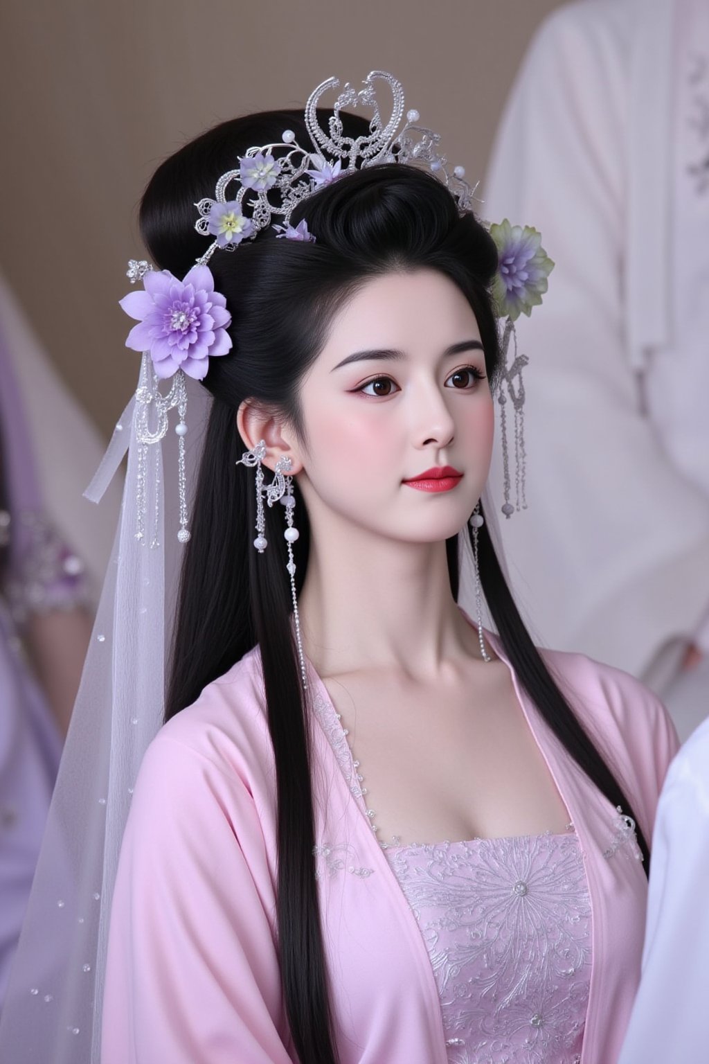 cfairy,
The image is a high-resolution photograph of a young East Asian woman with fair skin and a serene expression. She has long, straight black hair styled in an elaborate updo adorned with intricate floral hair accessories in pastel shades of purple and white. A delicate, silver headpiece with small, ornate flowers and beads sits atop her head, adding a touch of elegance. Her makeup is minimal, featuring a subtle pink blush and a natural lip color. She wears a traditional Chinese robe in a soft pink hue, with intricate embroidery and lace detailing. Her robe is open at the chest, revealing a white undergarment with subtle patterns. 

In the background, there is a blurred out-of-focus person wearing a white, possibly ceremonial, robe with intricate designs, suggesting a traditional setting. The lighting is soft and diffused, highlighting the textures of her clothing and the delicate details of her hair accessories. The overall color palette is muted and serene, with pastel tones dominating the scene. The image captures a moment of quiet contemplation, possibly during a cultural or religious event, emphasizing the beauty and grace of traditional East Asian attire and hairstyles.