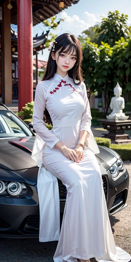 A beautiful Vietnamese girl wearing a traditional ao dai with a family crest for the Lunar New Year, holding a lotus flower, sits in a temple and lights incense in front of a Buddha statue, wishing him peace. Her husband in tuxedo with luxury watch and car stand behind her. 