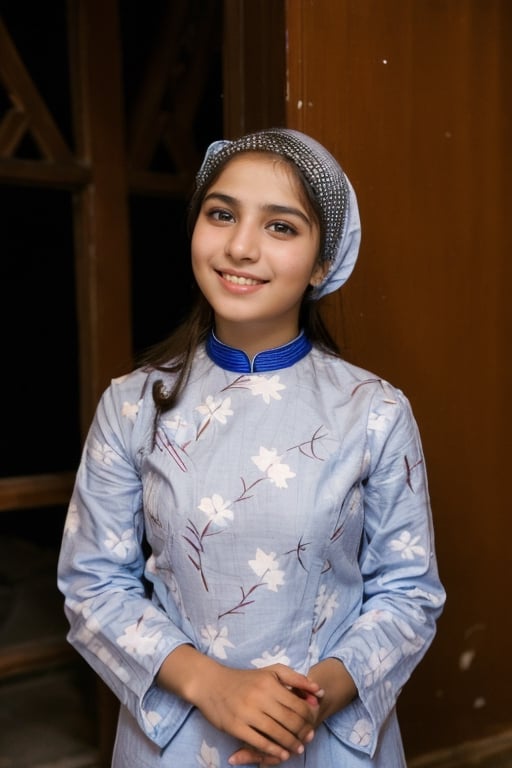 Muslim cute young girl, smiling, wearing pashto traditional dress