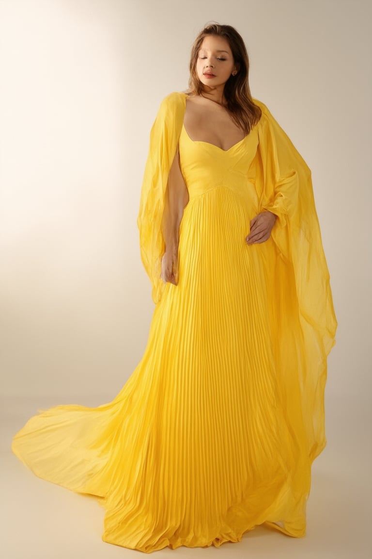 A vibrant yellow canvas awaits! A photograph captures a bright, sunshine-yellow model posing against a soft white background, subtle gradient transitioning to a warm beige. The subject's figure is elegantly draped in a flowing yellow gown with delicate pleats and folds. The lighting is natural, with gentle warmth and a hint of shadowing on the model's face, emphasizing the golden tone.