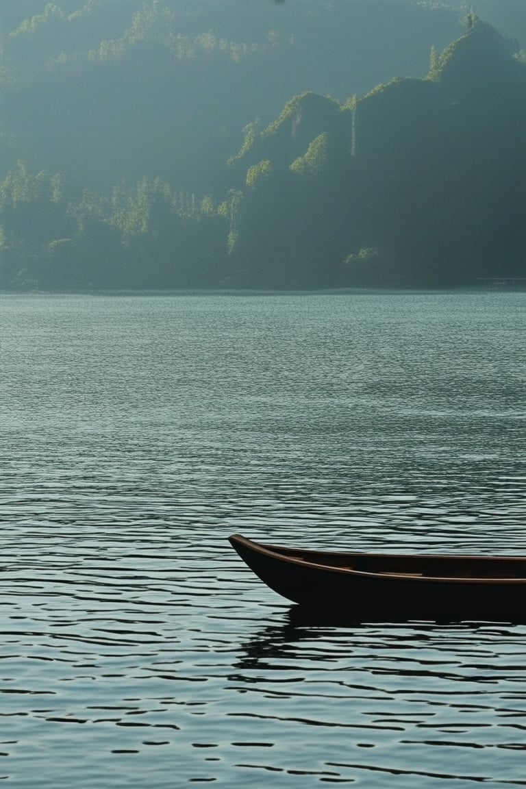 A serene Mandana Koka lake scene: Soft morning light casts a warm glow on the water's surface, with subtle ripples reflecting the surrounding lush greenery. A lone wooden boat drifts lazily in the distance, while the misty mountains rise softly into the horizon. The atmosphere is peaceful, inviting contemplation.