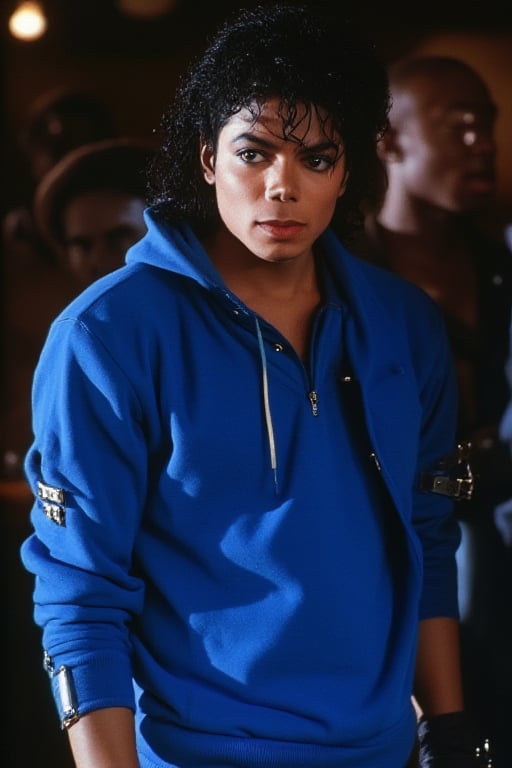 Michael Jackson putting on a blue hoodie 