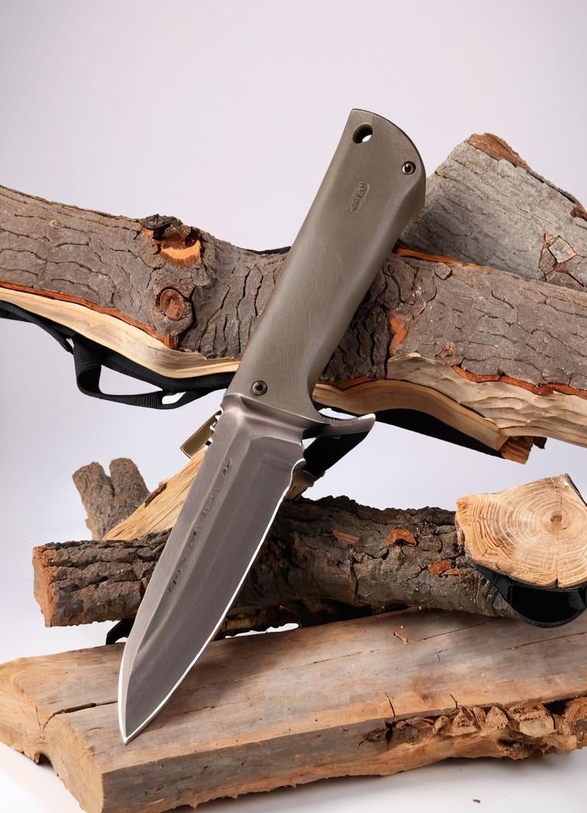 Real estate photography style <lora:FF-Knives-XL-Cr2-v0163:1> a knife sitting on top of a piece of wood next to a piece of wood with a knife sticking out of it's blade on top of a piece of wood that has a piece of wood that has been taken out of wood with some sort of wood that has been taken out of it and has been taken out of it, gradient, gradient background, military, military vehicle, tank focus, vehicle focus <lora:FF.68.furtasticxl_BetaEPOCHS3.lora:0.41>,(Cathode tube:1.3) . Professional, inviting, well-lit, high-resolution, property-focused, commercial, highly detailed