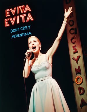 Color Photo of Eva Peron singing "Don't Cry for Me, Argentina" at a Broadway Musical, Stage Neon Sign says "Evita"