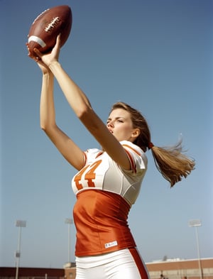 Dutch angle. Photo, Closeup of female quarterback throwing a football, showing midriff. Canon 5d mark 4, Kodak ektar, style by J.C. Leyendecker