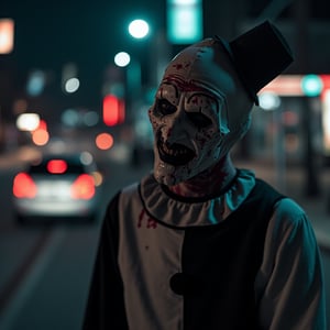 landscape photography of a slim artclown in his black and white outfit in a gore scene cutting off a person's head,  nighttime cityscape,  blurred lights,  outdoor setting,  facing camera,  slight head tilt,  relaxed posture,  close-up shot,  eye-level angle,  centered subject,  at night,  cinematic lighting,  (side view:1.2),  shot on Panasonic Lumix G9 with Leica DG 42.5mm f-1.2 