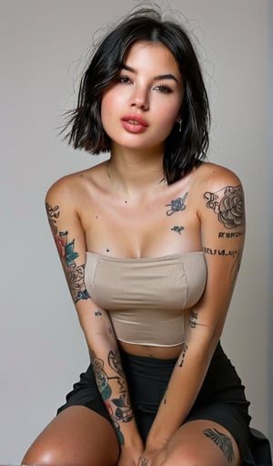 1girl, solo, breasts, short hair, skirt, simple background, black hair, white background, bare shoulders, brown eyes, medium breasts, sitting, parted lips, lips, strapless, tattoo, realistic, tube top, arm tattoo