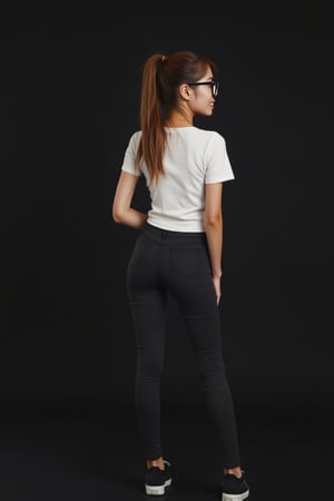 lynn, Lynn, petite, slim, Lynn's confident pose is captured from behind, showcasing her slender physique against a simple, dark background. Her ponytailed hair flows down the back of her head, framing her sleek black sneakers and black denim pants that peek out from under a white T-shirt with short sleeves. A subtle smile plays on her lips as she gazes off-camera, her round black-framed eyewear adding sophistication to her profile.