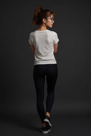 lynn, Lynn, petite, slim, Lynn's confident pose is captured from behind, showcasing her slender physique against a simple, dark background. Her ponytailed hair flows down the back of her head, framing her sleek black sneakers and black denim pants that peek out from under a white T-shirt with short sleeves. A subtle smile plays on her lips as she gazes off-camera, her round black-framed eyewear adding sophistication to her profile.