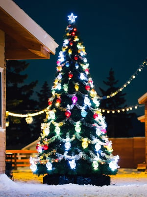 masterpiece, best quality, christmas tree, outdoors, night, christmas ornaments, lights, 