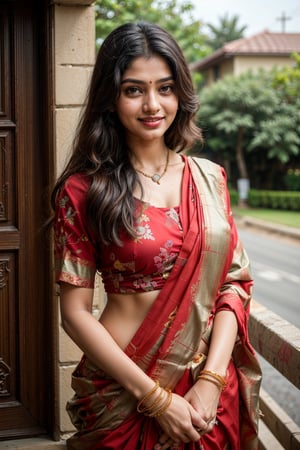  a vibrant and sunny day in a city in Tamil Nadu. A 19-year-old girl named Meera at the wedding . She is wearing a traditional saree , Her long, dark hair is adorned , and she has a gentle smile on her face, exuding confidence and grace.,Saree 