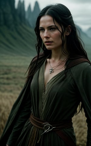 photo of arwen undomiel from Lord of the Rings, film grain, dramatic cinematic lut,realistic,character,photorealistic
