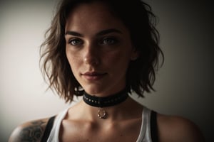 photo, rule of thirds, dramatic lighting, medium hair, detailed face, detailed nose, woman wearing tank top, freckles, collar or choker, smirk, tattoo, intricate background ,realism,realistic,raw,analog,woman,portrait,photorealistic,analog,realism, nsfw, collar