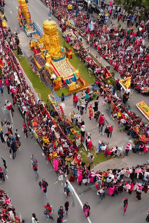 birds eye view of a procession, Indian temple, tamil king with family on a chariot, people welcoming the king family