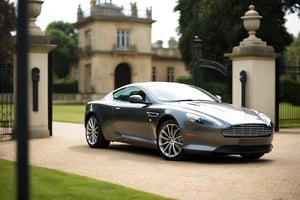 A stunning shot frames the luxurious Aston Martin DB9, parked majestically before a grandiose mansion's imposing facade. Softly blurred lawn and ornate gates harmonize with the car's sleek silhouette, emphasizing its refined elegance. As the confident driver emerges in tailored attire, his poise and sophistication are perfectly captured against the backdrop of opulence.