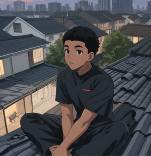 
black boy sitting on the roof of a building in the evening