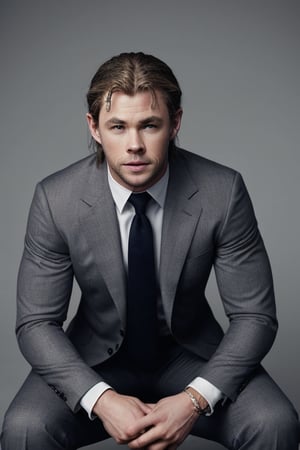 Chris Hemsworth wearing suit 