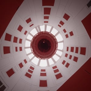 (Kodak:1.1), portal large house, mysterious, conceptual, indoors, (((fractal hall))), (((camera view from above))), red and white shades, lut, explosion from the bottom of the building, Movie Still,Movie Still,Film Still