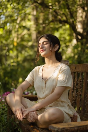 A warm sunlight illuminates Kalyani Priyadarshan's serene expression, set against a soft focus background of lush greenery. Her gentle smile and closed eyes evoke a sense of peace, as she sits cross-legged on a intricately carved wooden bench amidst the tranquil surroundings.