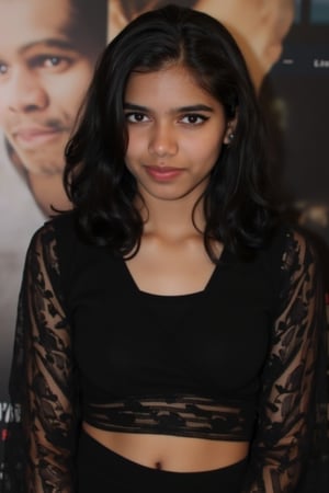  A young woman stands confidently against a movie poster backdrop, her gaze directed straight at the camera, exuding an air of confidence and allure, She wears a black top with a lace pattern, her features softly highlighted by even lighting, Off-center placement draws the viewer's eye towards her, while a subtle hint of a man in the background adds depth to the scene, The movie poster suggests a possible movie theater setting, 