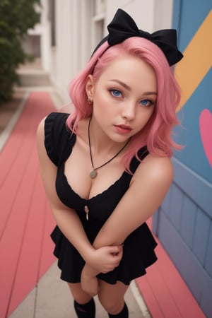 Captured from a low-angle perspective, a girl stands in front of a red fence. The girl is dressed in a black and pink outfit, adorned with a pink bow on her head. Her hair is a vibrant shade of pink, adding a pop of color to the scene. Her eyes are a piercing blue, and her lips are a darker shade of blue. Her hands are clasped in her hands. She is wearing a black necklace with a white pendant. Her socks are adorned with black laces that are tied in a bow at the bottom. The background is blurred, creating a vibrant contrast to the girl 