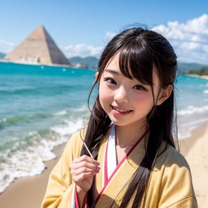 A six-year-old Japanese girl with long black hair, wearing a traditional kimono, stands in front of a camera, facing forward. She is standing on a bright, sunny beach by the sea, with soft sand beneath her feet and a majestic pyramid in the background. The girl's expression is one of joy and wonder, her eyes sparkling as she takes in the beauty of the beach and the pyramid. The lighting is bright and cheerful, casting a warm glow on the scene.