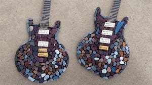 rock_2_img, rock image, rock art, rock, one stone electric guitar shape fully made out of rocks, full view, High detail, rock, best quality, (just a shape, not a real guitar you stupid AI)