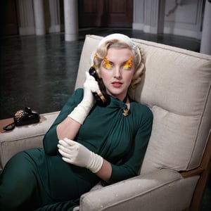 burningeyes, color photograph, 1960s photograph, long shot, Marilyn Monroe, age 30s, laying on side, blond hair, white headscarf, red lipstick, black mascara, dark emerald green dress, long sleeves, stockings, white elbow length gloves, talking on black and gold telephone, telephone cord, beige armchair, wooden side table, green box, round bottle, dark floor, pillars, columns, grey walls, large brown door