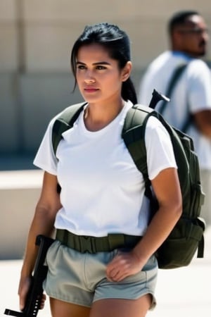 Female army officer, in white teeshirt, army shorts and boots, black hair is loose,  looking away from camera, hair loose, carrying assault-rifle, (((no backpack:1.4))), 