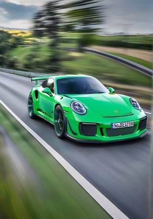 A Porsche 911 painted in Green drives along a higway road at speed