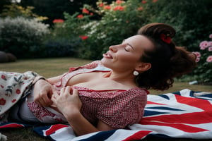 a woman in her 40´s lay on a blanket in the garden and enjoys the weather