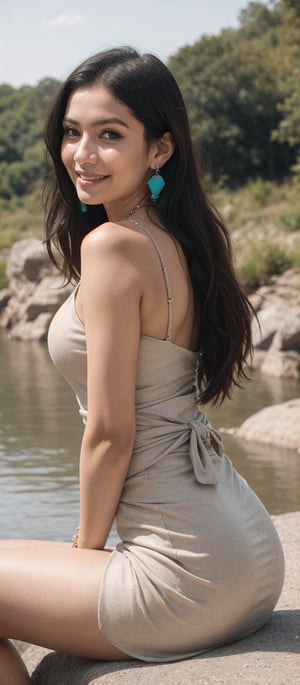 Generate hyper realistic image of a woman with long, flowing black hair that cascades down her back. Her hair is shiny and well-maintained. She has expressive eyes with a friendly and inviting look, enhanced by her natural makeup. She is wearing a beige dress with intricate details and embellishments. The dress has a low-cut neckline adorned with delicate trim and fringe, and it fits snugly around her waist before flowing out. She wears a striking turquoise necklace and matching earrings. She is seated by a serene riverside, her body slightly turned to the side. One hand rests on her knee while the other is gently touching the ground. Her expression is warm and approachable, with a bright smile that lights up her face.