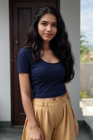 A stunning young woman poses confidently in a bright, sunlit room. She wears an ACMM SS outfit with a striking blue top adorned with intricate designs. The camera frames her from the chest up, highlighting her radiant smile and sparkling eyes. Soft, golden light illuminates her face, while the surrounding space is subtly blurred to emphasize her beauty.