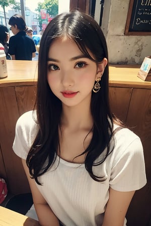 girl age of 18 , wearing punjibe shut, with earings and bangles , in coffe shop