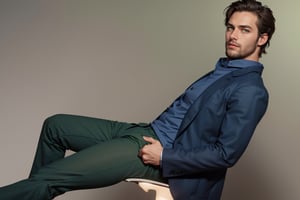 high resolution, masterpiece, ((handsome man, man's face, strong jaw, average body but not too developed, ((short brown hair, unkempt, messy)), with a little beard, (((light green eyes) )), facing viewer, sitting slightly bent over, ((dressed in an elegant suit, dark blue shirt underneath, dark gray shirt jacket and dark gray pants, hands in pockets)), photo set, gray background, professional photography, professional lighting