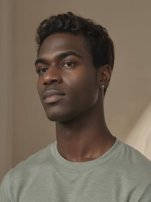 black man, Perfect (((Hands)), perfect ((fingers)),A young man, half-length, with a slight smile and looking at the camera. Perspective and quality: frontal, 10k, focus on face, high detail. Determining mood: hyperrealistic, realistic style, white background, soft light, vivid colors, symmetrical face, pure black almond-shaped eyes, crystal clear black skin, realistic looking eyes, black lips, thin eyebrows, long eyelashes, black eyeshadow, Extremely Realistic,inst4 style,