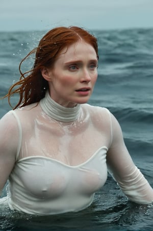 Bryce Dallas Howard, emerging from the water. Her head and shoulders are visible above the surface of water. She looks scared and sad, her white turtleneck top wet and clinging to her, with water droplets sparkling around her. She is in the middle of a cold ocean and splashes from her emergence. 