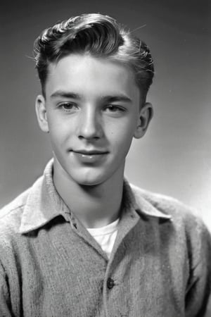 A 1950s black and white photo of a teenage handsome singer