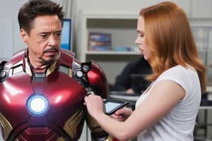 Tony Stark  working with Natasha Romanoff (Scarlet Johansson) testing an Iron Man armour